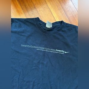 Vintage NIKE anniversary tee ; 2XL sized ; black with a nice fade ; rare tee